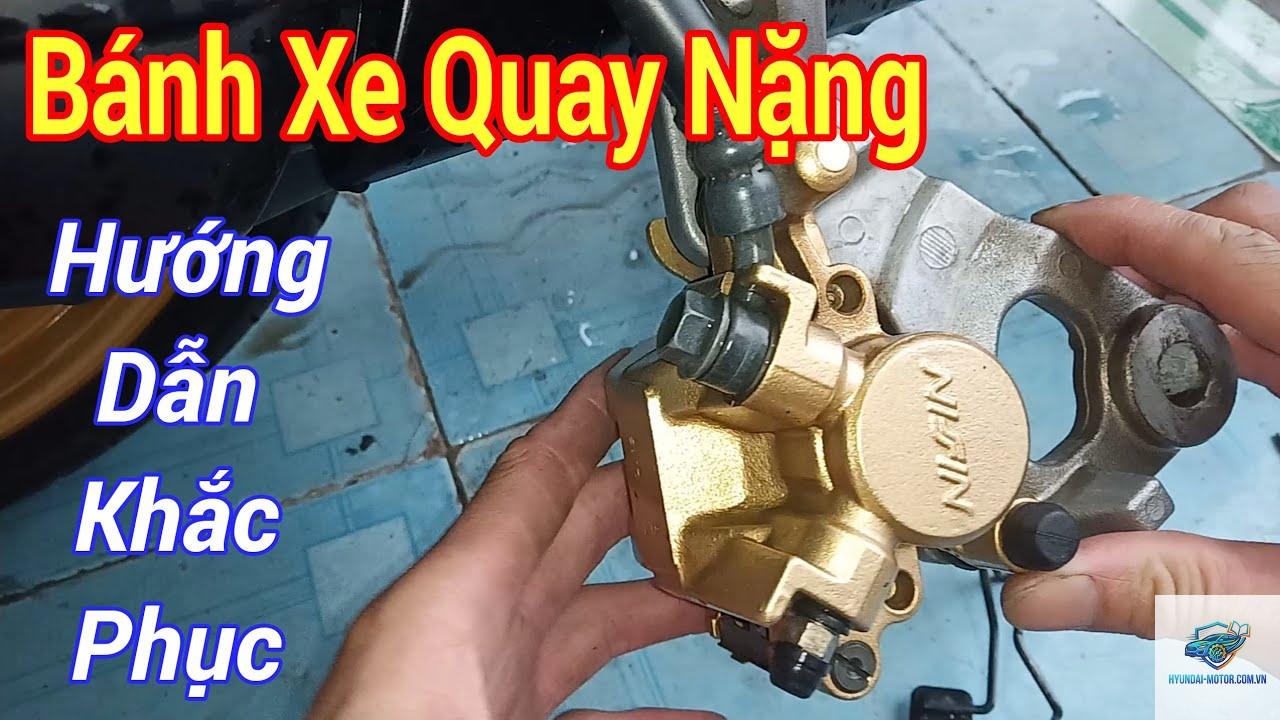 xe máy bánh xe quay nặng - Hình 1