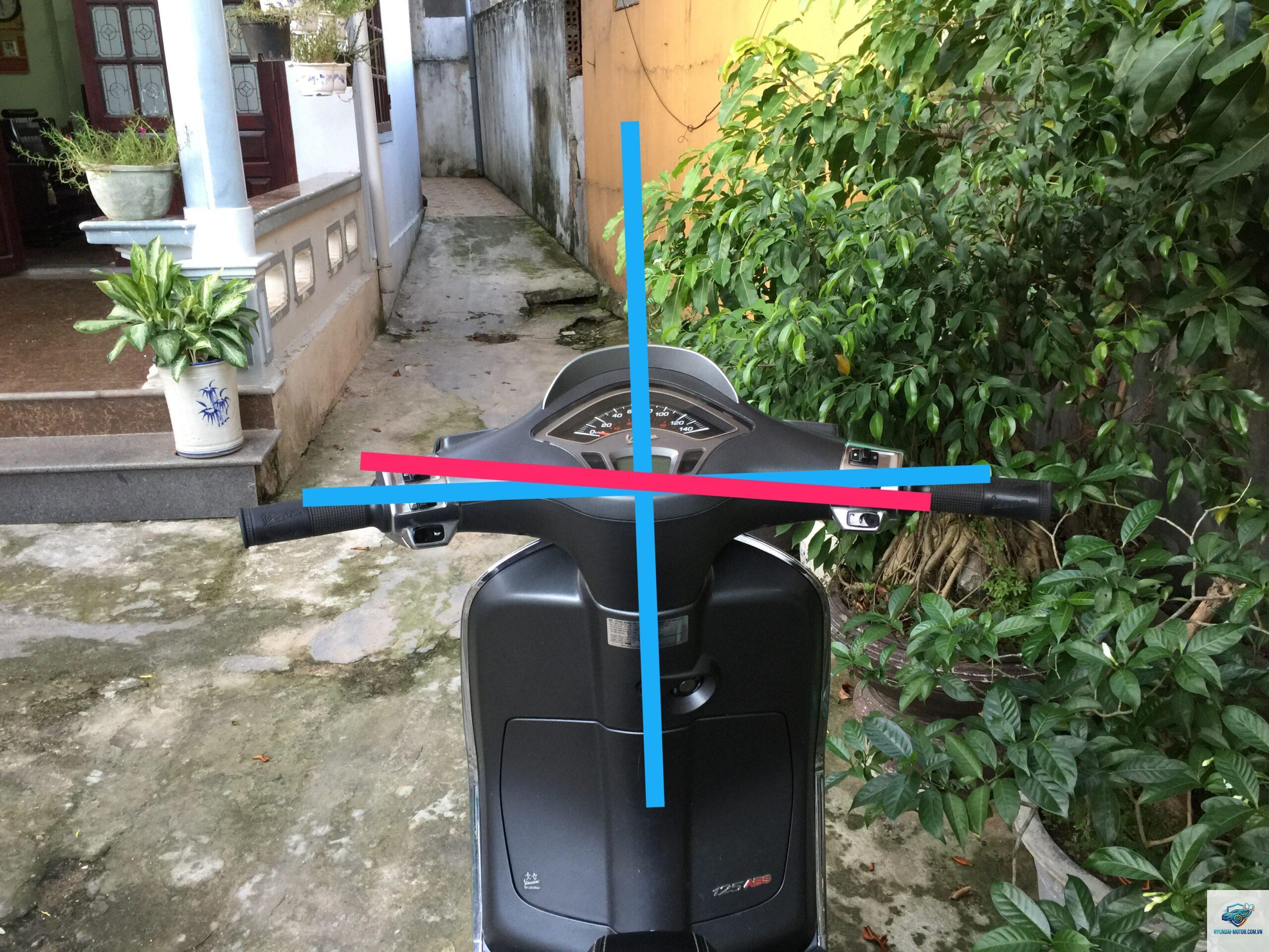xe máy chạy bị nghiêng - Hình 3