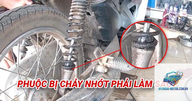xe máy phuộc sau bị chảy dầu